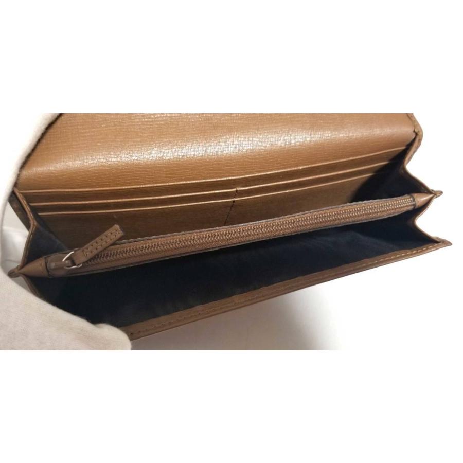 GUCCI（グッチ） 長財布 ベルトデザイン 型押し レザー 295616